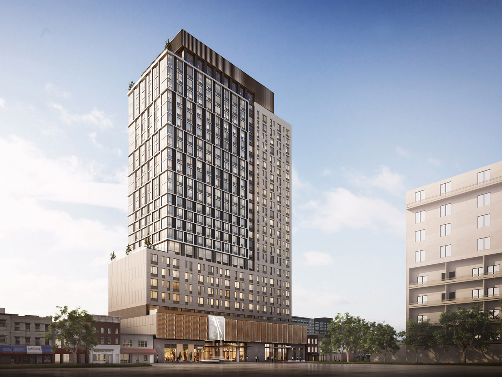 A realistic rendering of a contemporary residential building under a clear sky, showcasing its tall stature amidst a mixed urban landscape with adjacent buildings in New Jersey.