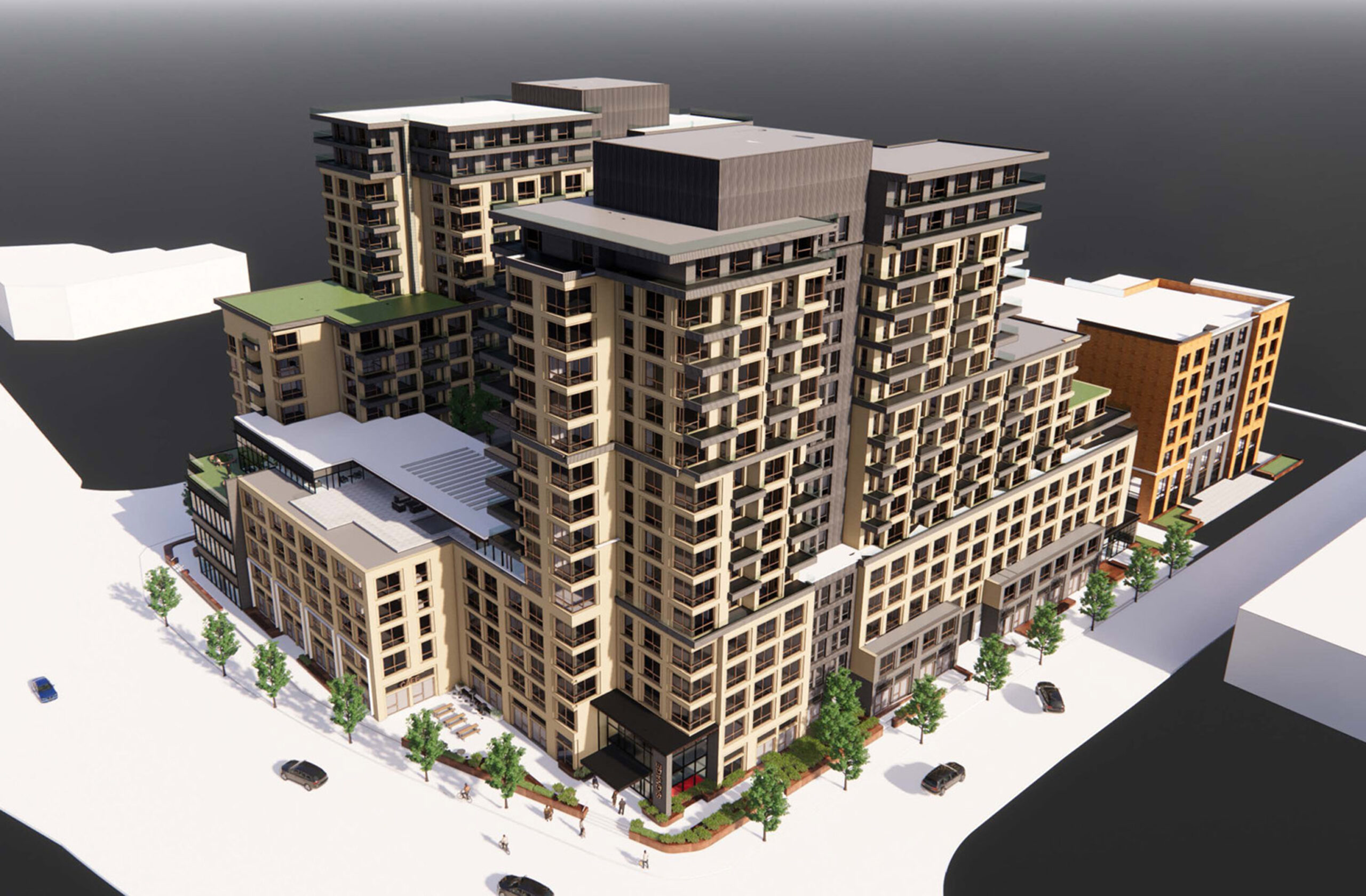 Aerial view of a modern multi-story residential building with mixed-material facade, expansive balconies, and integrated green spaces, surrounded by water on a clear day.