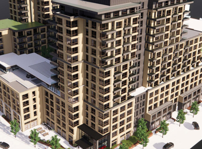 Aerial view of a modern multi-story residential building with mixed-material facade, expansive balconies, and integrated green spaces, surrounded by water on a clear day.